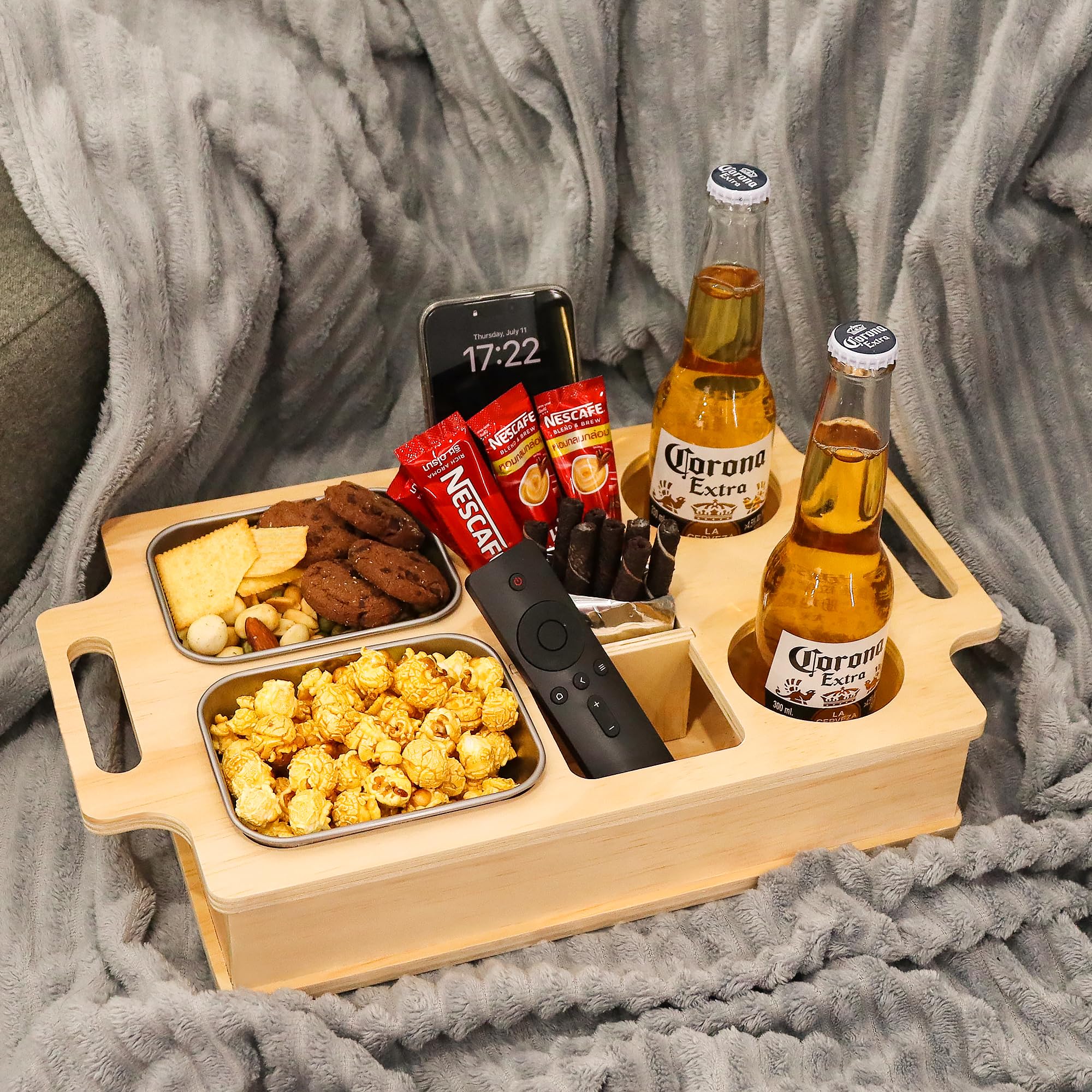 Primo Lines couch cup holder keeps drinks within reach for movie nights.