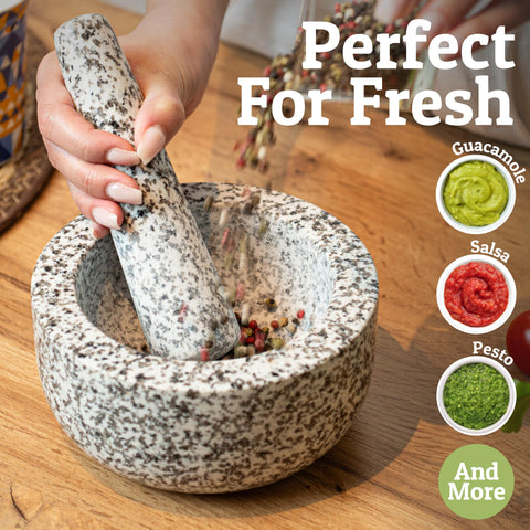 Traditional stone mortar used as a modern kitchen tool.