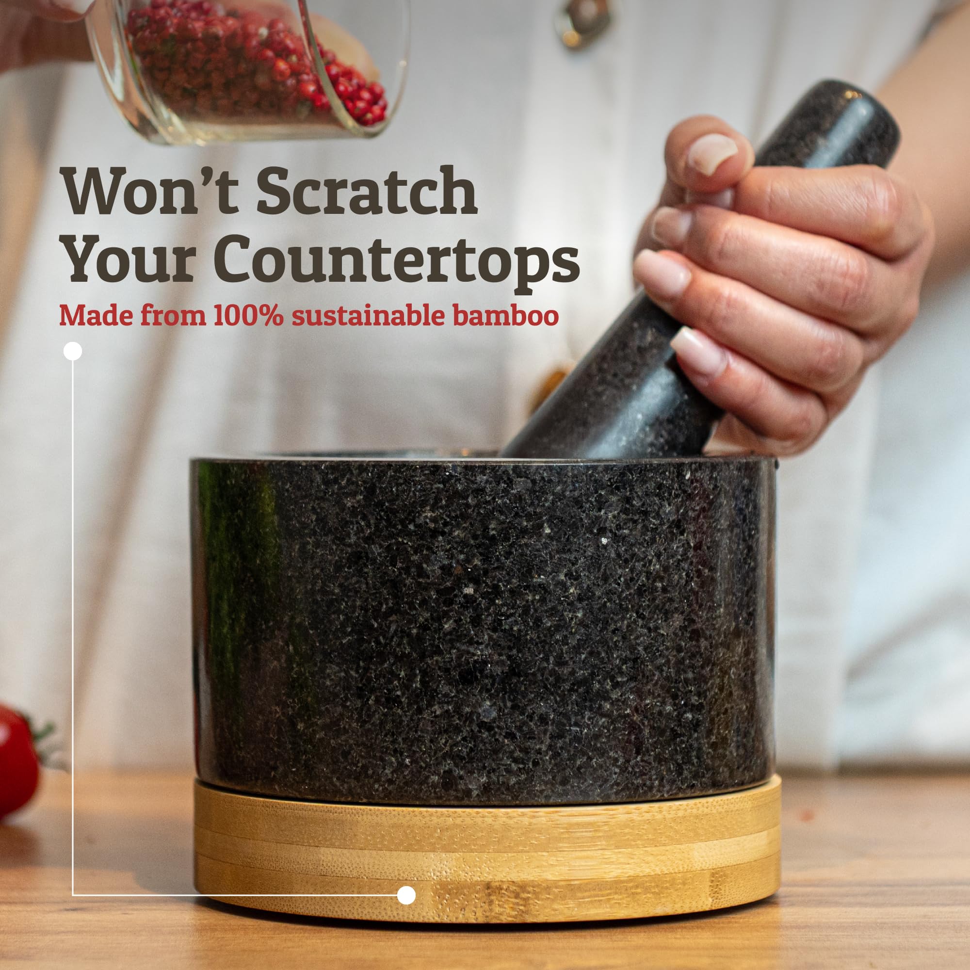 Priority Chef pestle and mortar in use, showcasing tactile grinding.