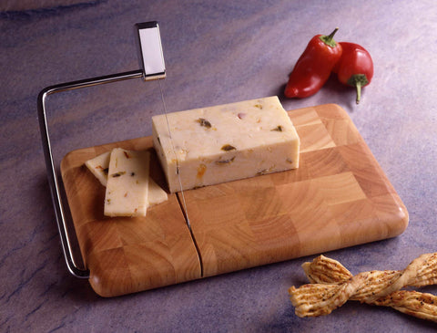 Prodyne bright chrome slicing arm for smooth, effortless cheese cutting.