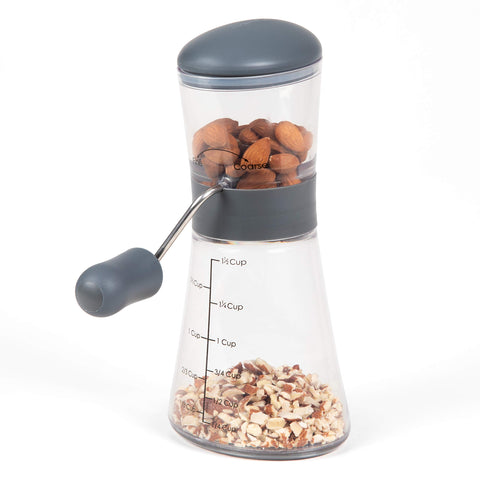 Progressive Nut Chopper dome lid provides secure grip during chopping.
