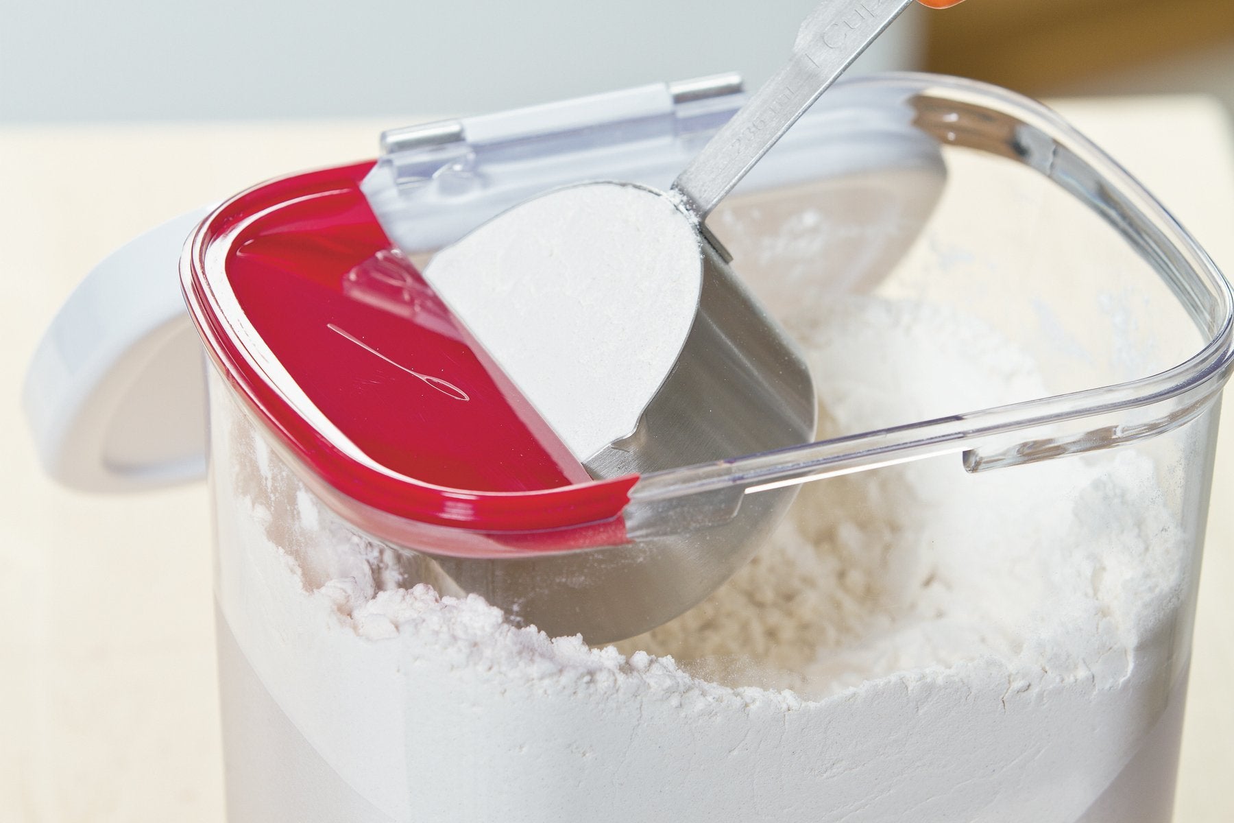 Progressive PrepSolutions Flour Keeper open lid enables one-handed access for quick refills.