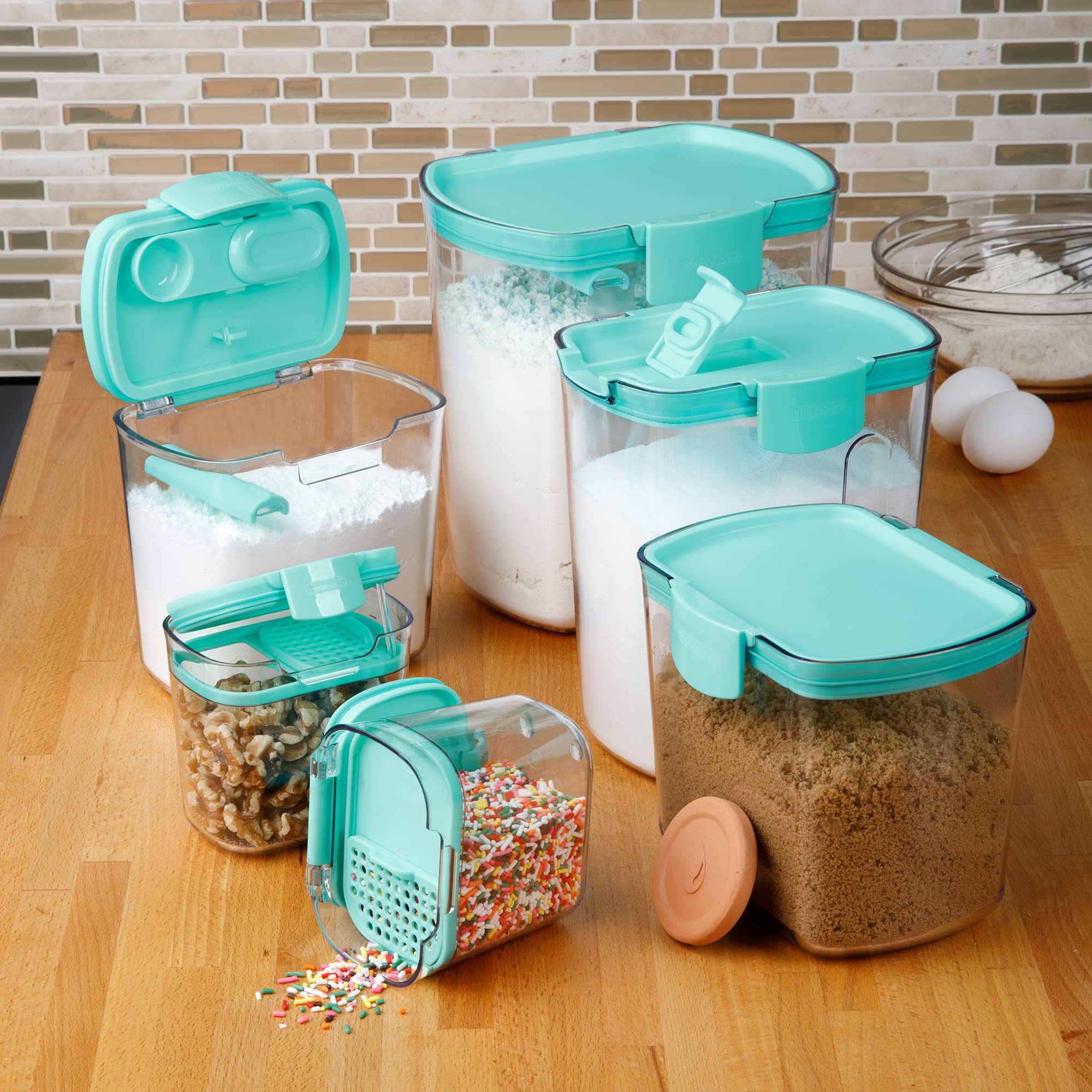 Progressive ProKeeper 2.5 qt sugar keeper with flip-to-pour spout for controlled pouring.