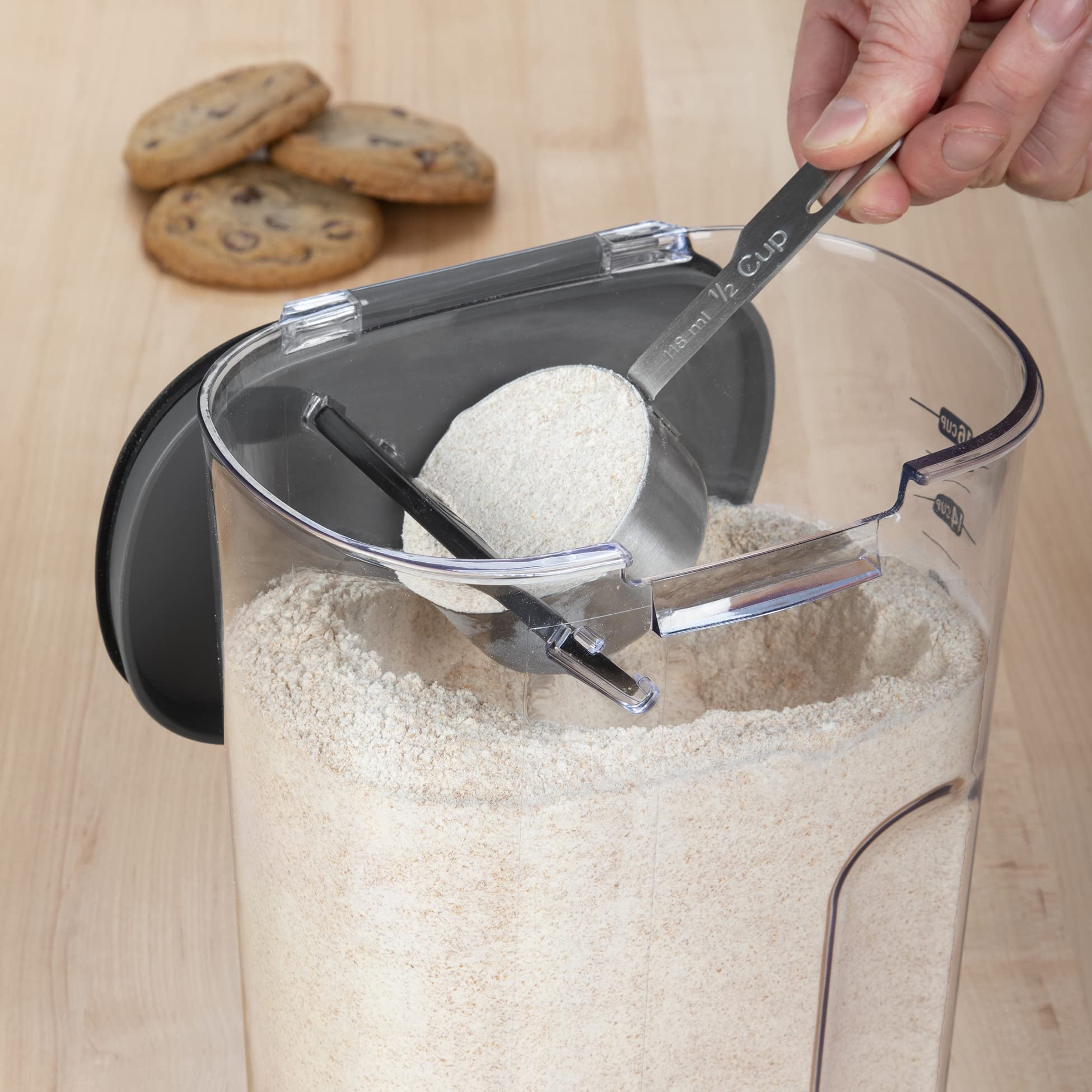 Progressive ProKeeper+ flour container measuring scoop helps accurate portions.