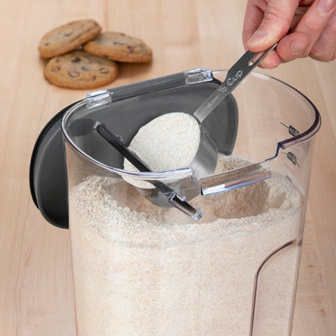 Progressive ProKeeper+ flour container measuring scoop helps accurate portions.
