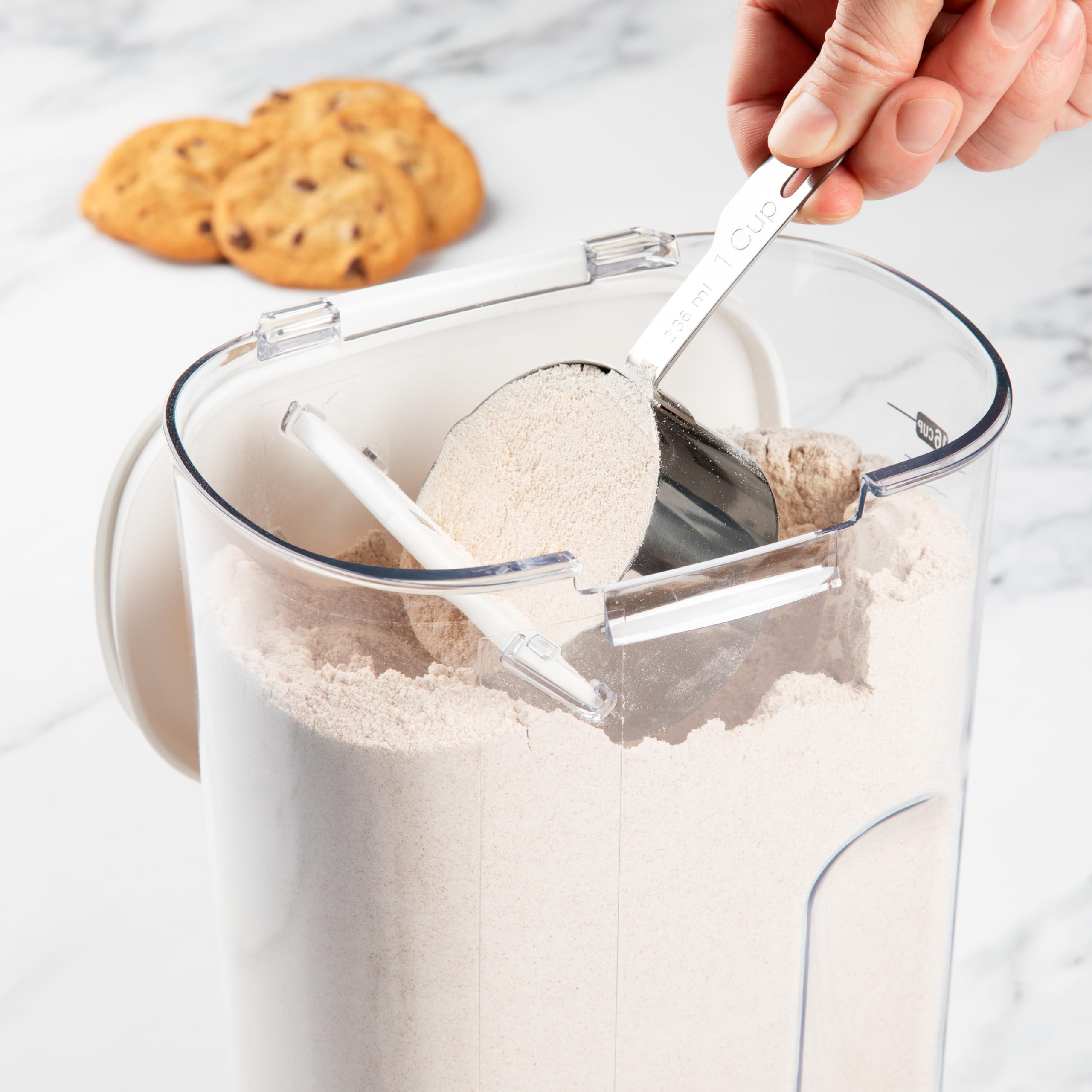 ProKeeper+ Powdered Sugar Keeper with magnetic dusting spoon for easy dusting.