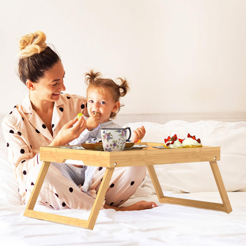 Promitop bamboo bed tray used on bed for breakfast in bed