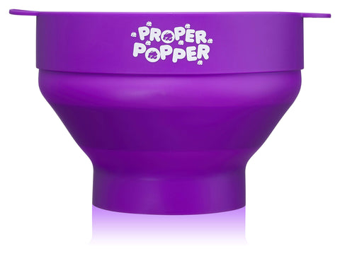 PROPER POPPER lid in place prevents kernels from popping out