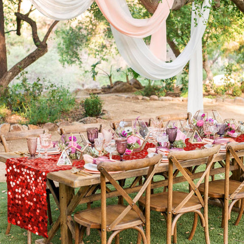 Bridal shower table styled with Pufogu red sequin runner