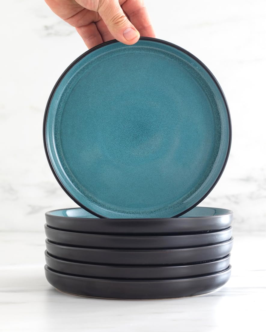 Table setting shows black and petrol blue tones for casual dinners