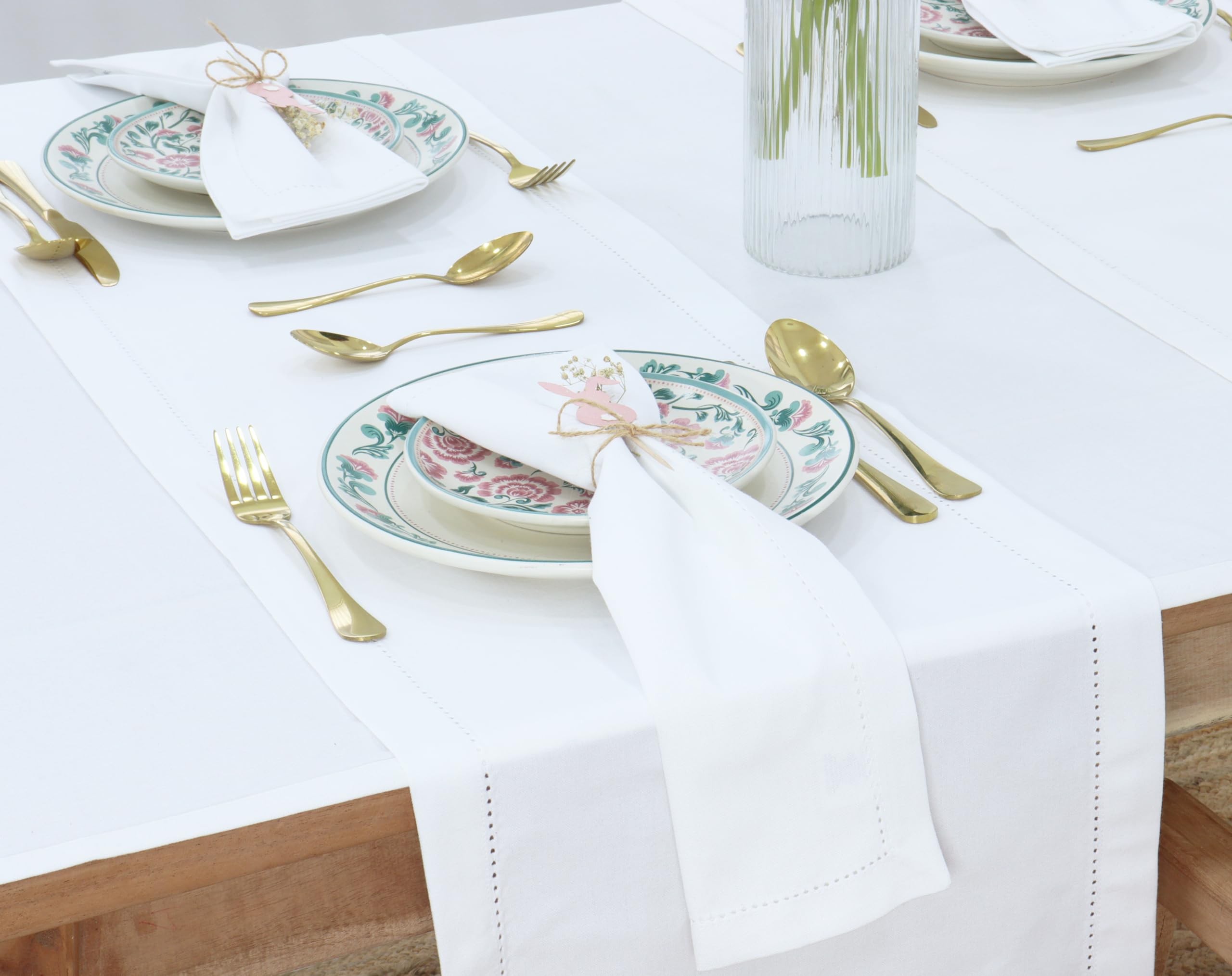 PurpleEssences napkin with mitered corner detail elevating table presentation.