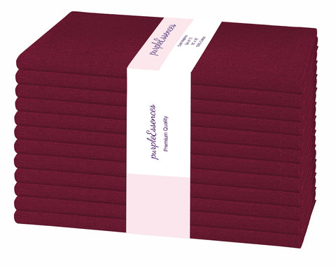 PurpleEssences 12-pack cotton napkins laid out for a table setting, showcasing premium textile quality