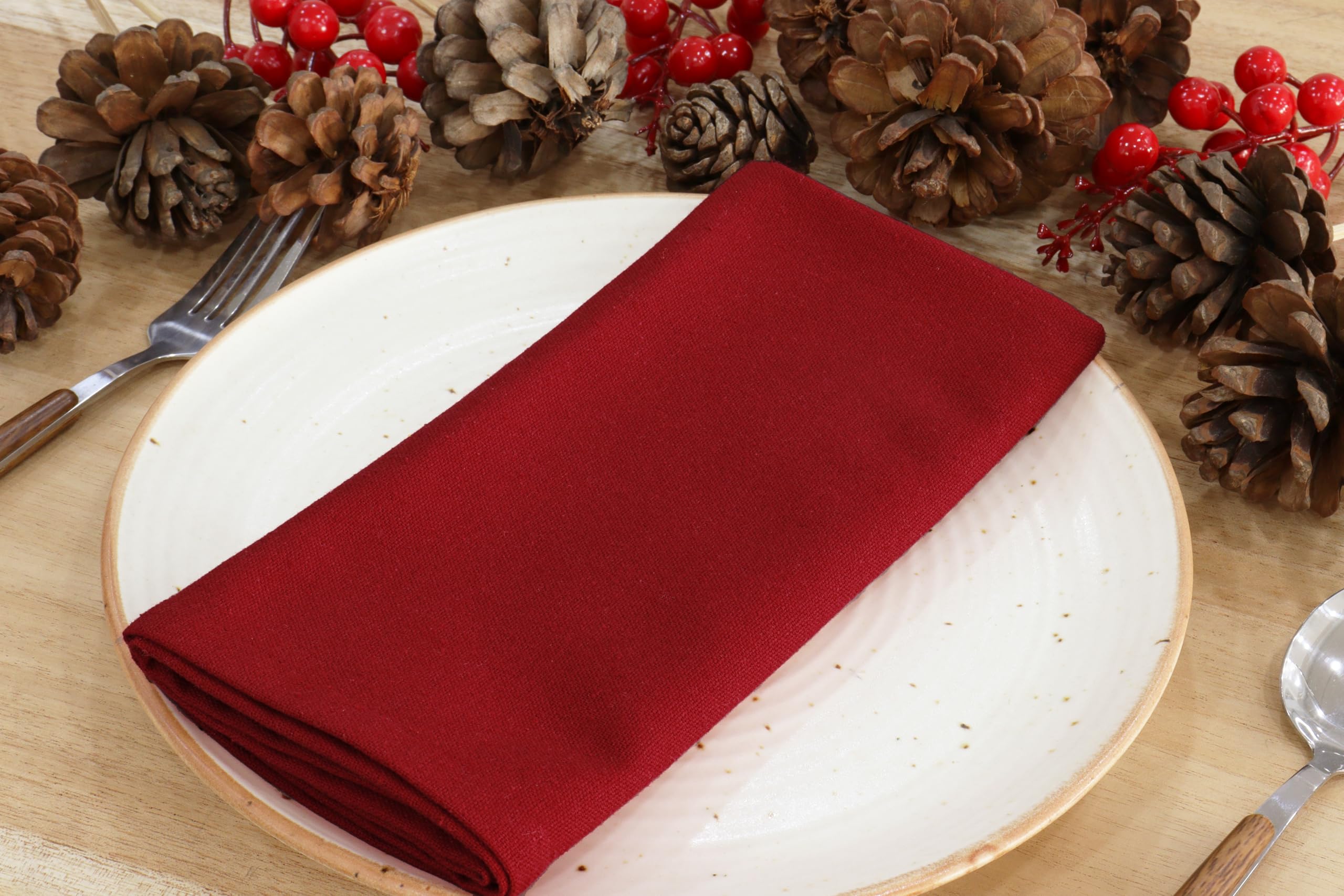 PurpleEssences napkins red closeup shows soft cotton texture for premium dining.