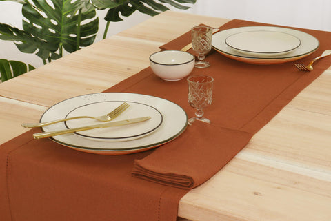 PurpleEssences rust napkins measure 18x18 inches for versatile table layouts.