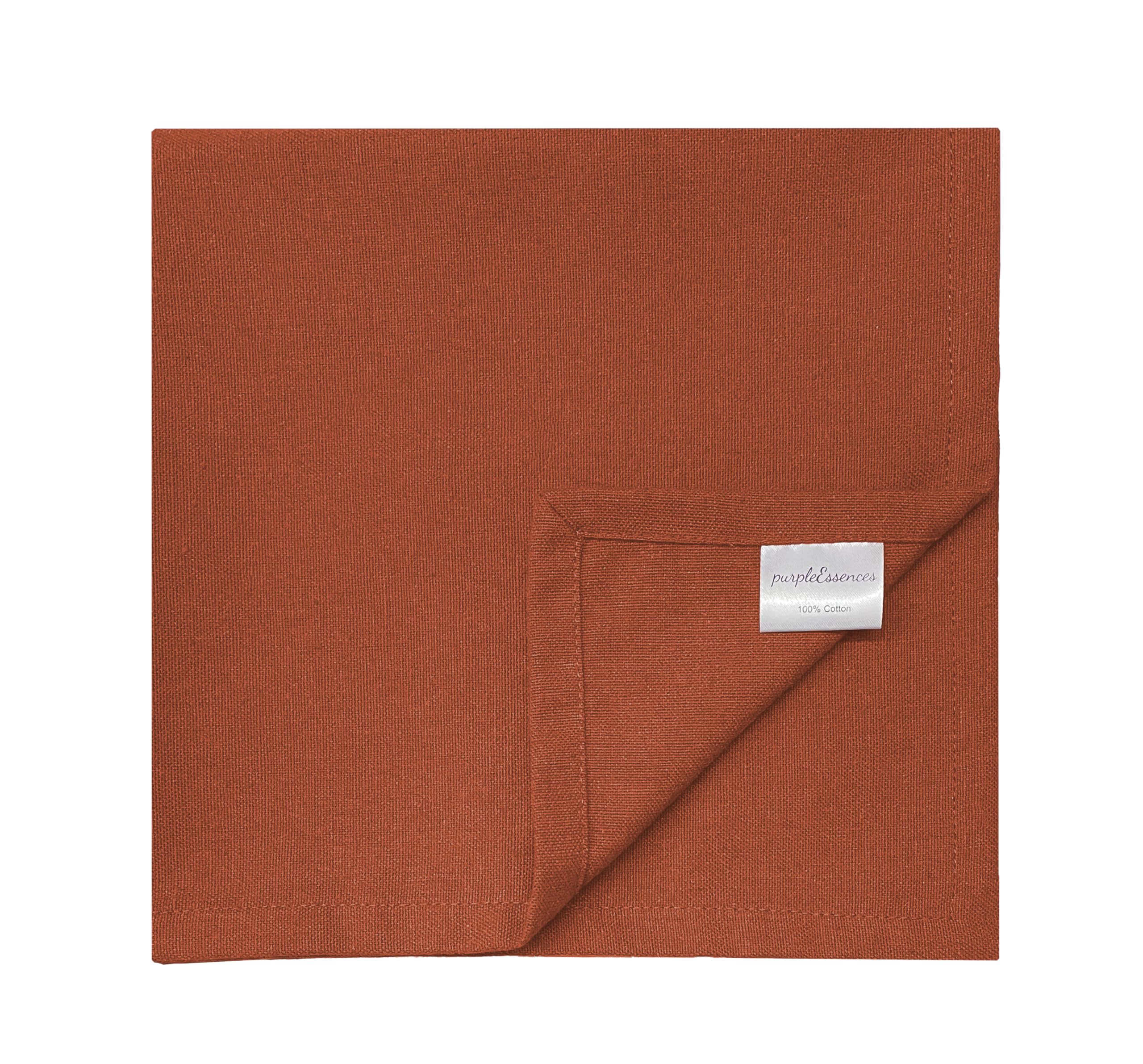 PurpleEssences rust napkins on a dining table enhance everyday meals with soft cotton touch.