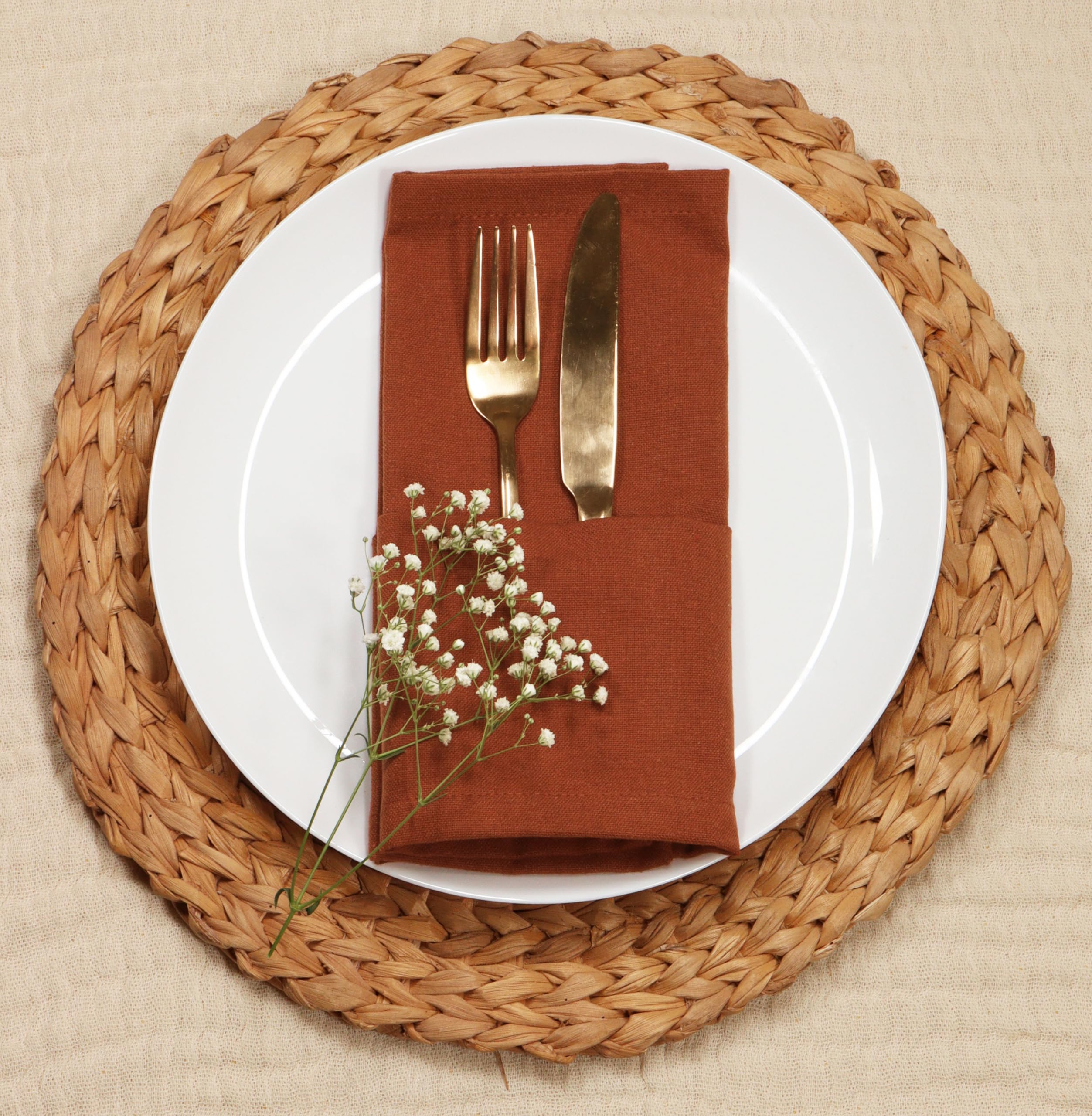 PurpleEssences rust napkins in a farmhouse-style setting, ideal for gatherings and family meals.
