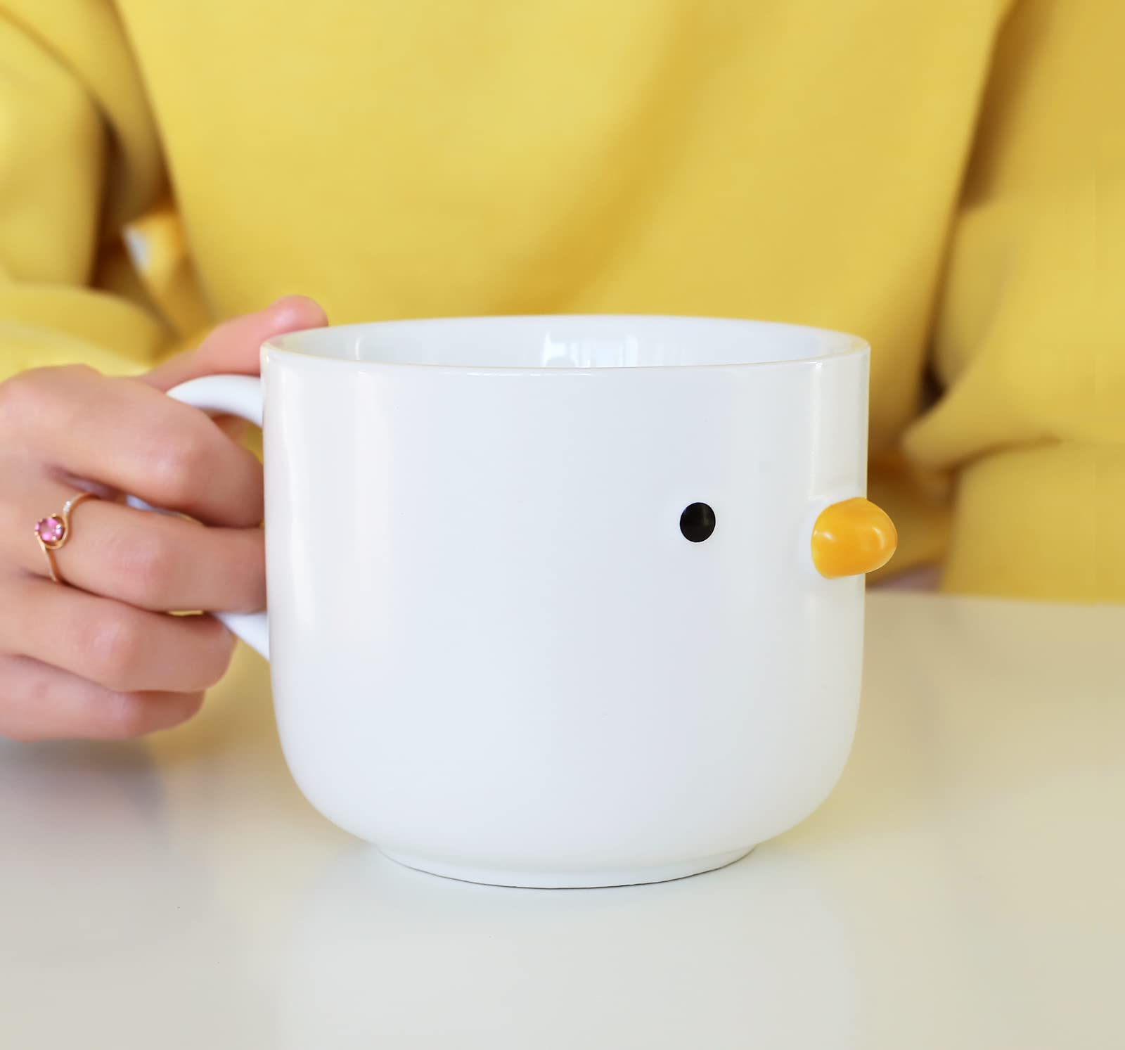 PURROOM chick-mouth design close-up emphasizes whimsical character during meals