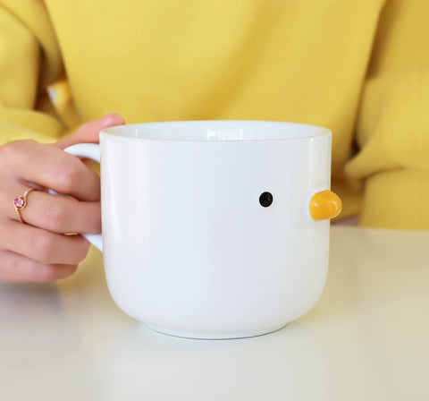 PURROOM chick-mouth design close-up emphasizes whimsical character during meals