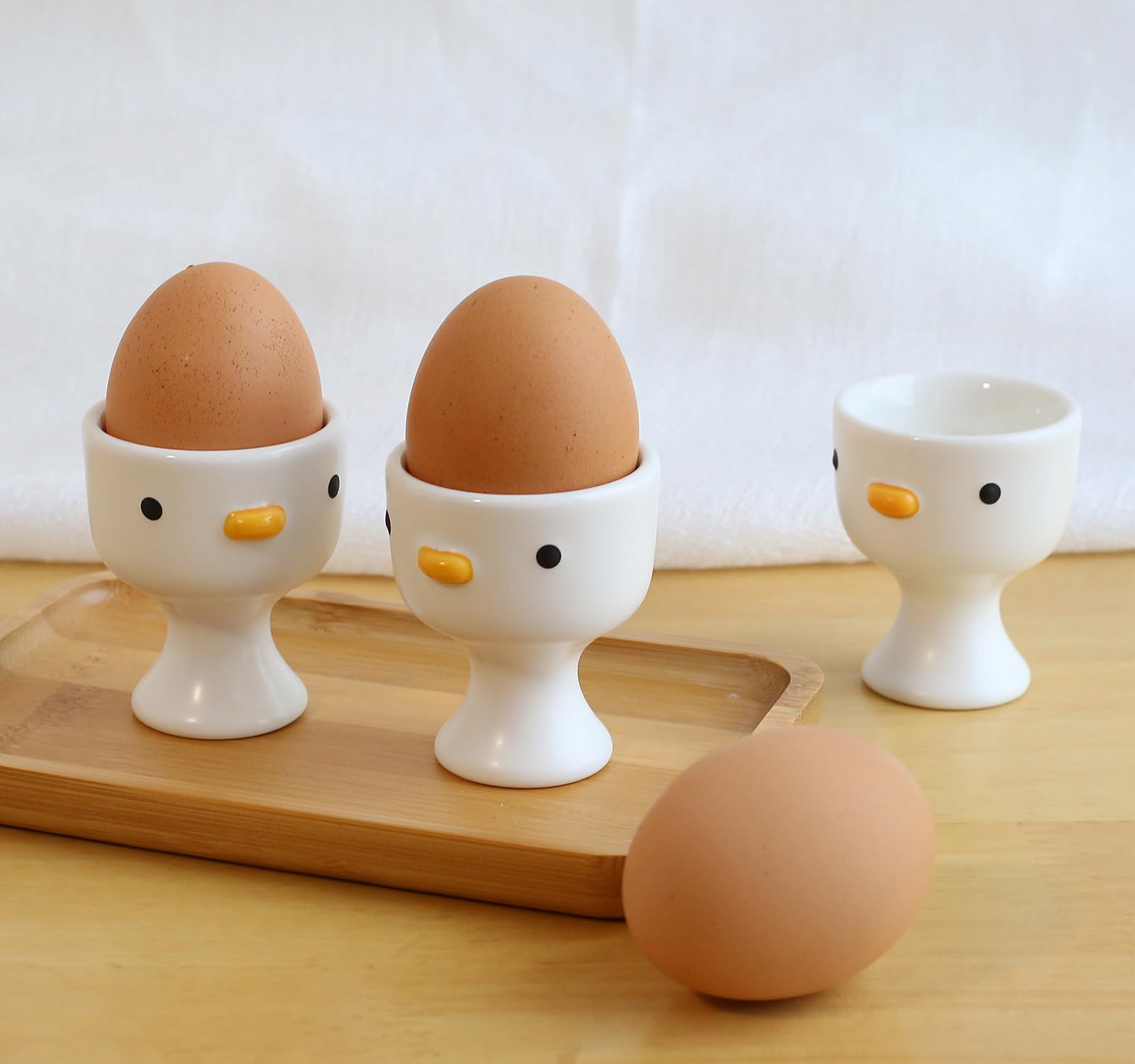 PURROOM hand-glazed yellow chick egg cup for cheerful mornings.