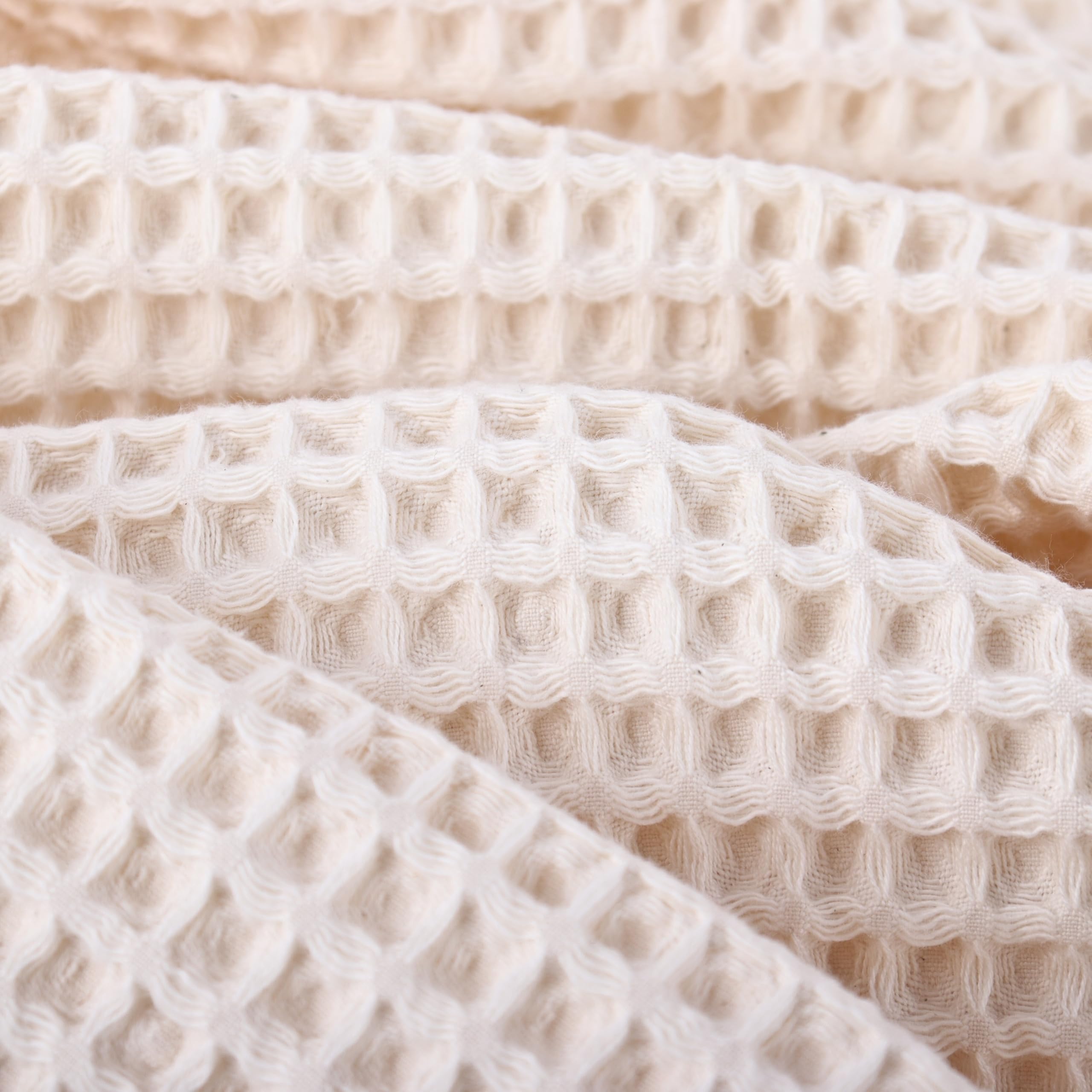 PÜSKÜL waffle-weave towel highlighting decorative texture in kitchen