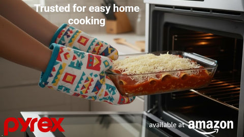 Pyrex 233-D dish with ergonomic handles enables easy lifting.