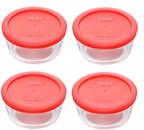 Pyrex 4-cup glass bowls with red lids, perfect for prep and storage.