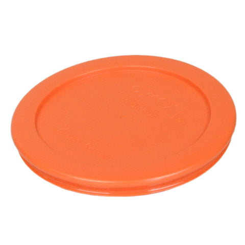 Pyrex orange lids on 2-cup bowls for secure refrigerator storage.