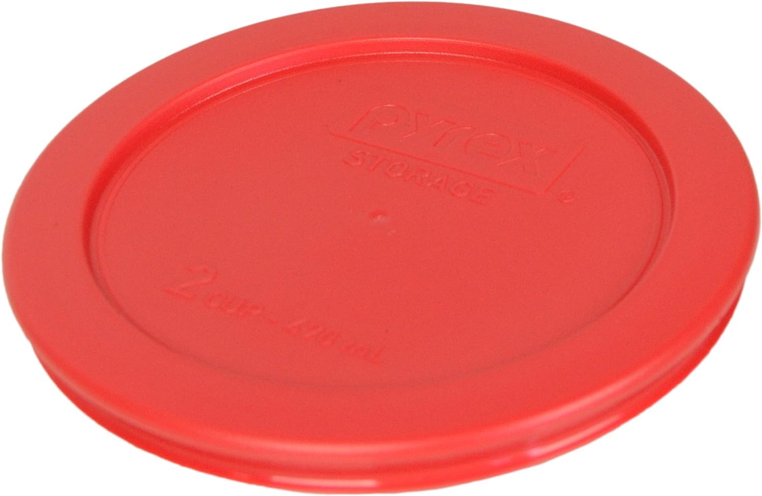 Pyrex 7200-PC red lid placed on a bowl showing a secure fit