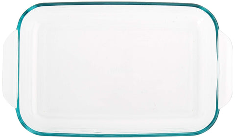 Pyrex Basics 2 Qt glass oblong dish in oven, evenly bakes thanks to nonporous glass.