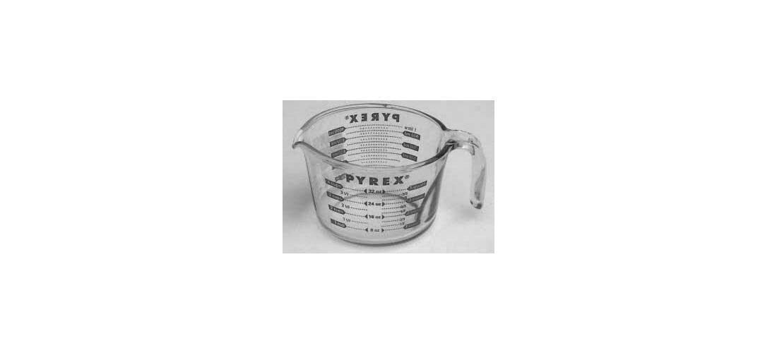 Pyrex Prepware 6001075 measuring cup with red graphics offers stackable storage.