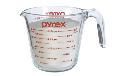 Pyrex Prepware measuring cup, oven safe for reheating or finishing recipes when needed.