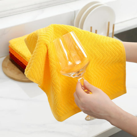 QAJ towel featuring hanging ring for easy air drying