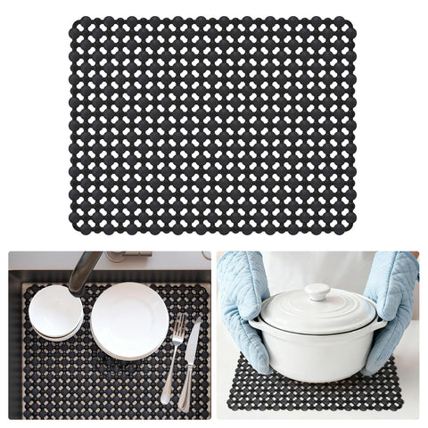 QiCaiJia trim-to-fit mat stays anchored on the sink bottom.
