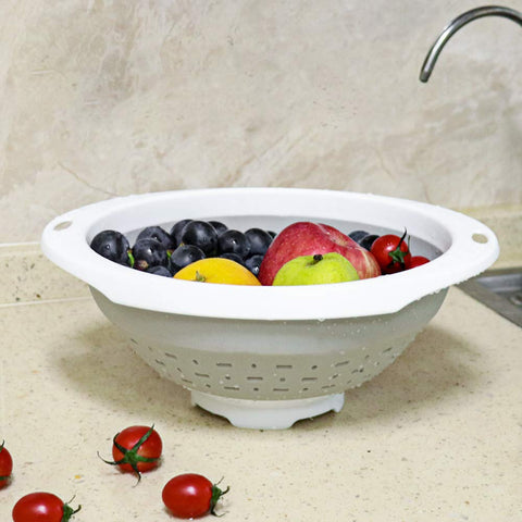 QiMH colander drying stand use demonstrates freestanding drying and air circulation.