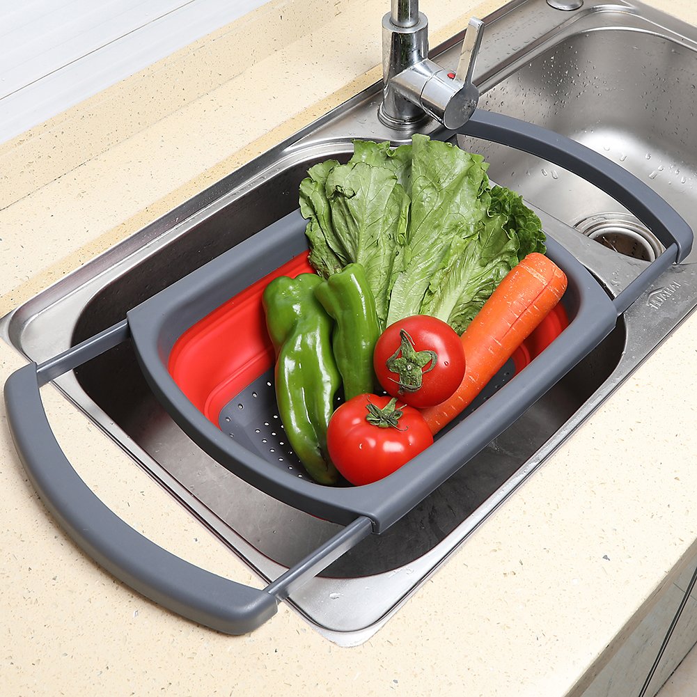 QiMH colander with extendable handles enabling stable draining over the sink
