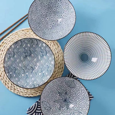 QINLANG set of 4 bowls ideal for family meals and sharing.