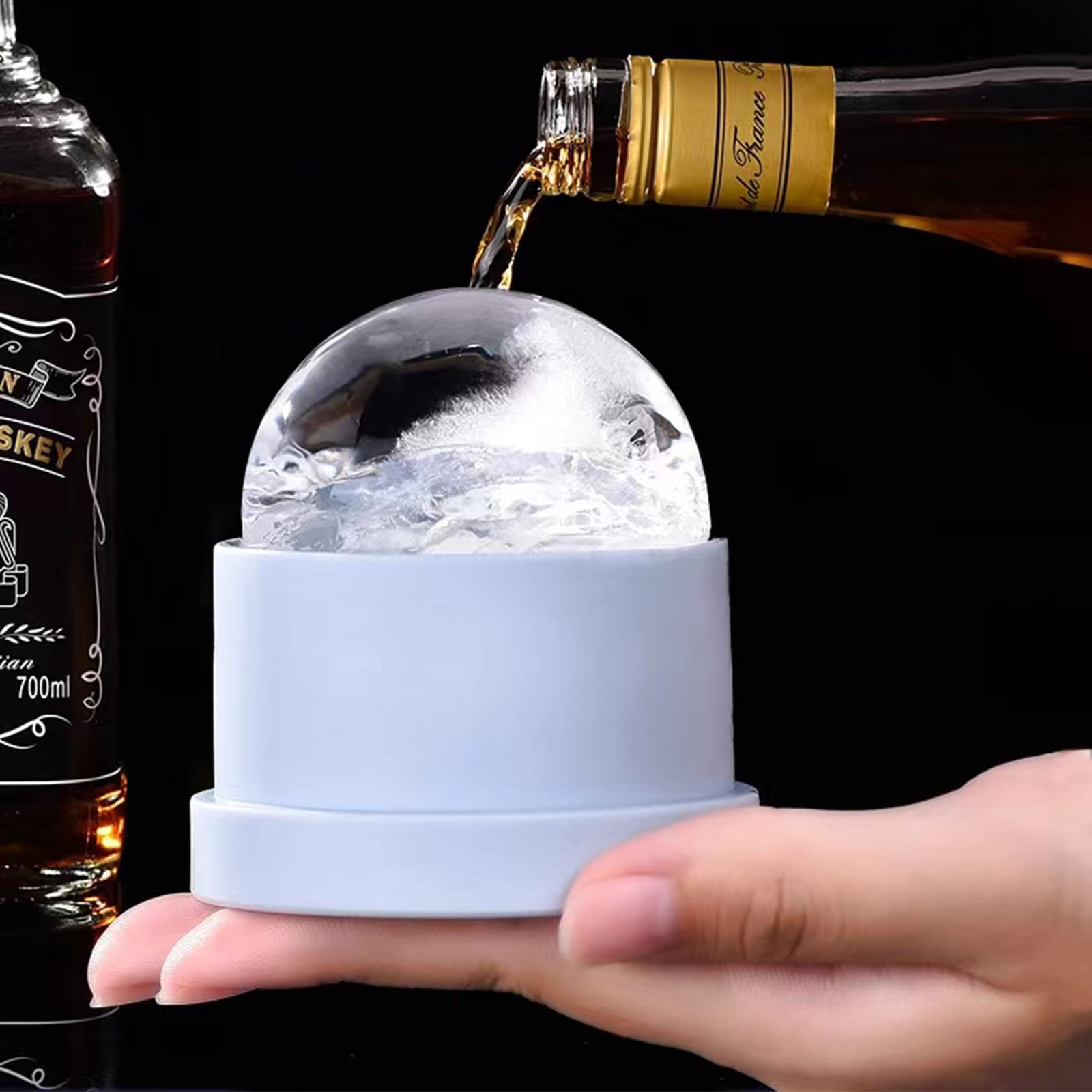 Qipecedm barware on table demonstrates versatile use for whiskey, cocktails, or water.