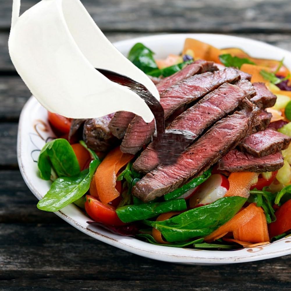 Qlans elegant gravy boat ideal for dressings and sauces in a refined setting