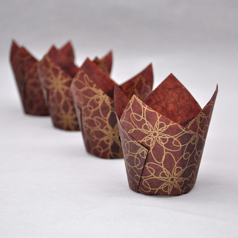 QLSmypkg tulip-design baking cups withstand up to 425 F for reliable baking.