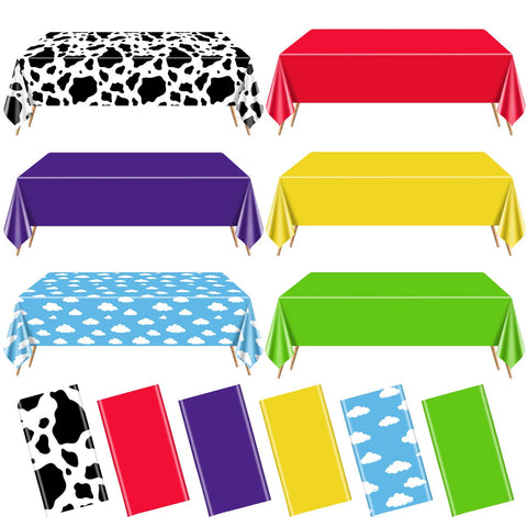 QUERICKY story tablecloth with sky clouds for playful party ambiance and surface protection.