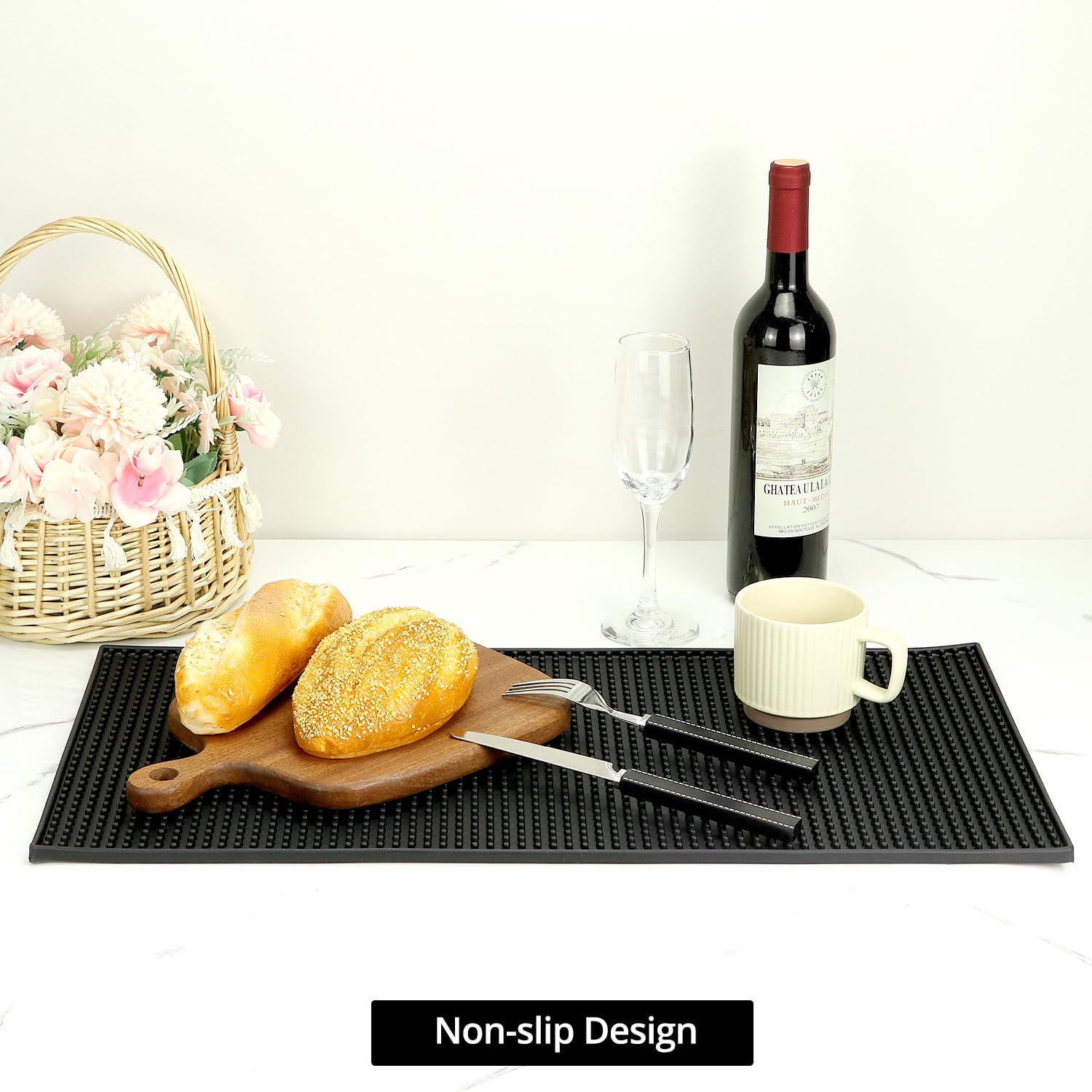 QWORK mat protects counters and glassware from spills.