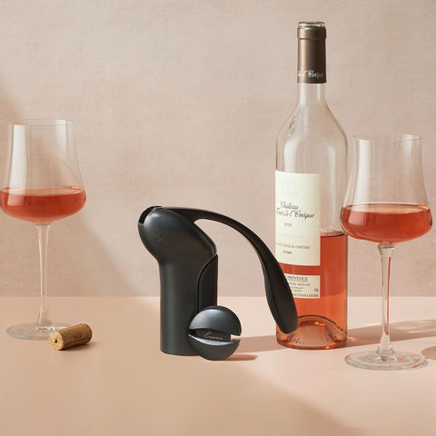 Rabbit compact vertical corkscrew stored neatly on a bar or counter.