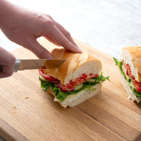 RADA bread knife cutting loaf to show crust and crumb separation