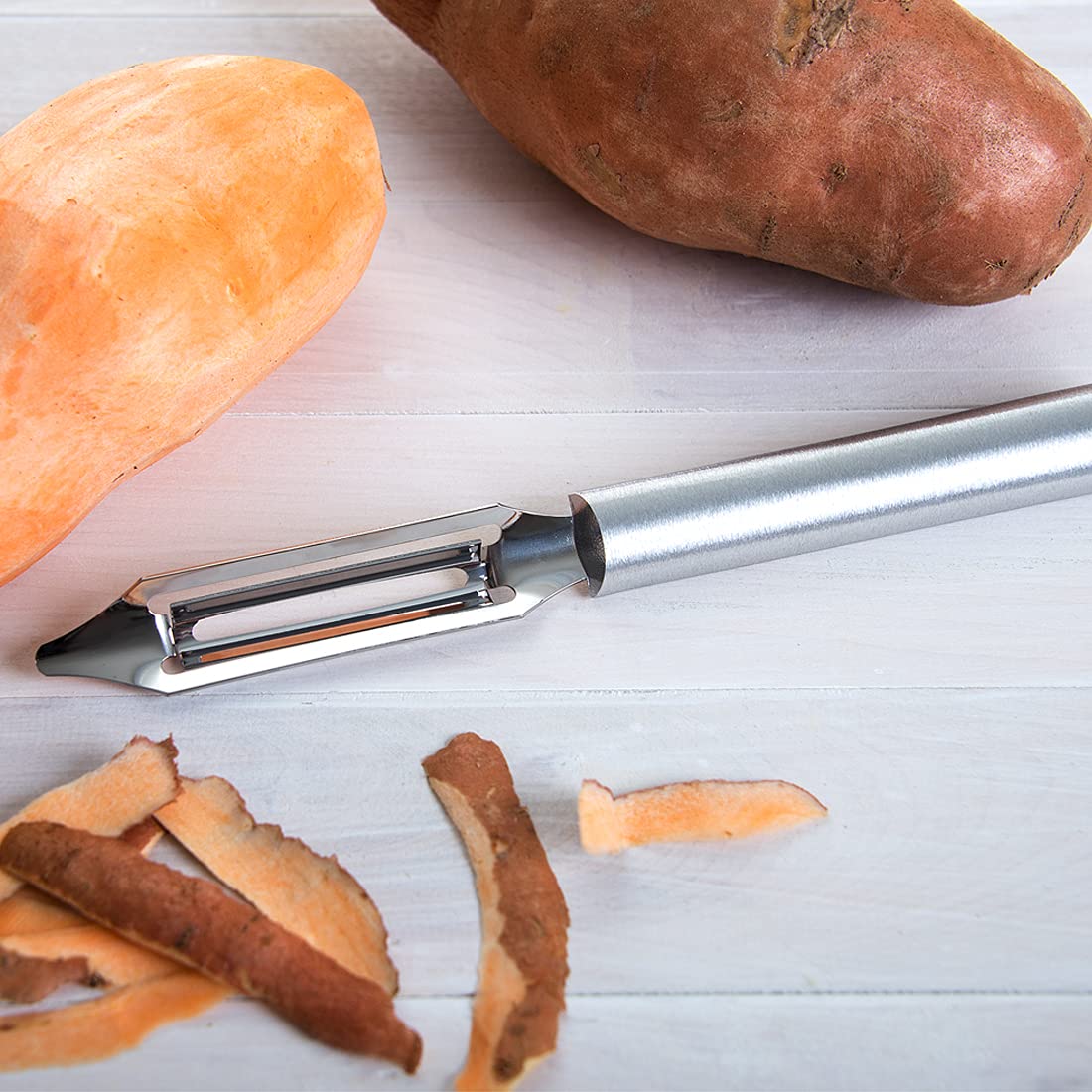 RADA Deluxe Vegetable Peeler tip removes eyes and stems accurately.