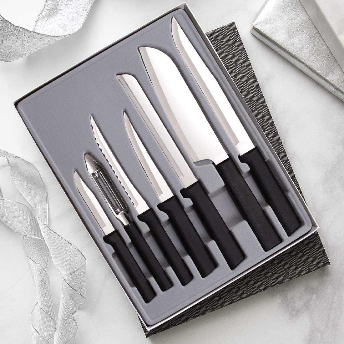 RADA quick edge sharpener keeps blades sharp for easy peeling and slicing.
