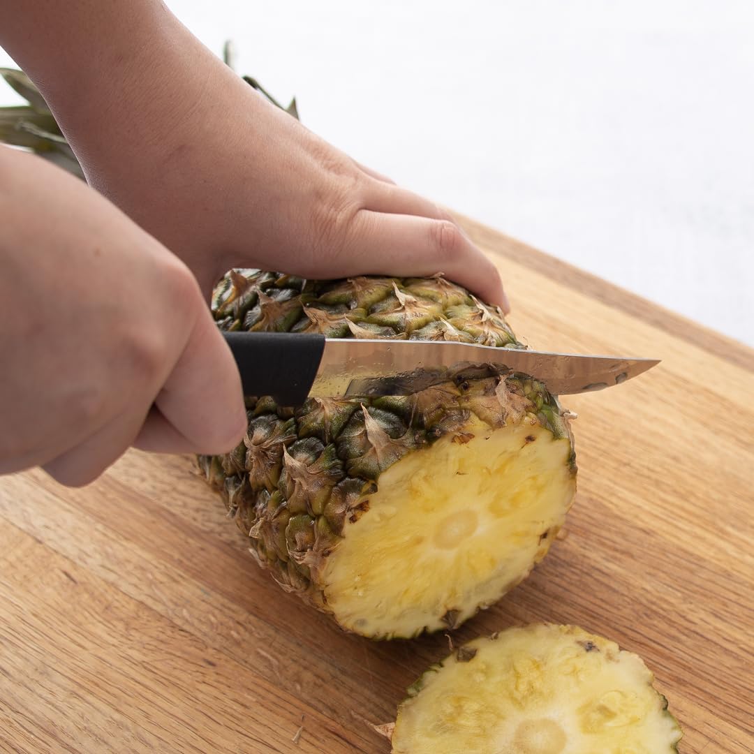 RADA Stubby Butcher Knife W206 in-use on vegetables with controlled precision.