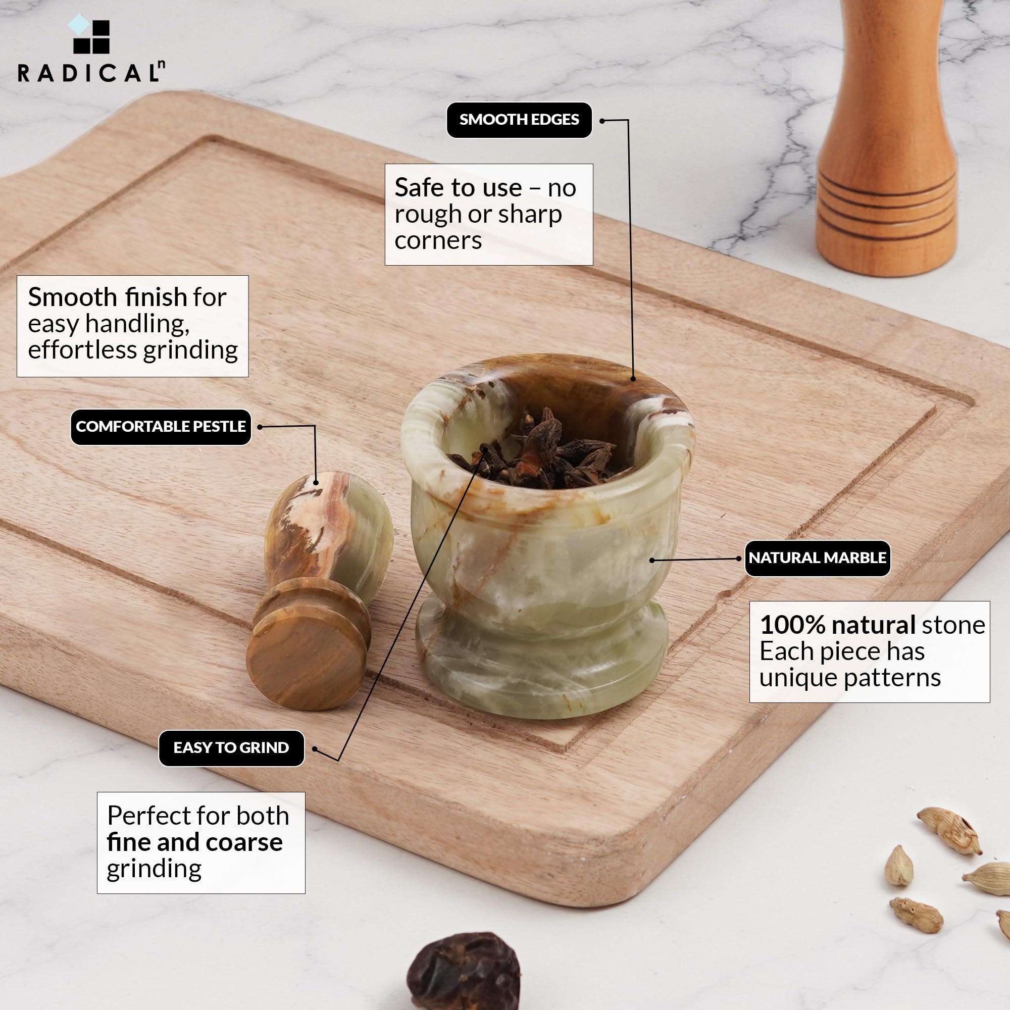 Radicaln cleaning the marble mortar pestle with a damp cloth.