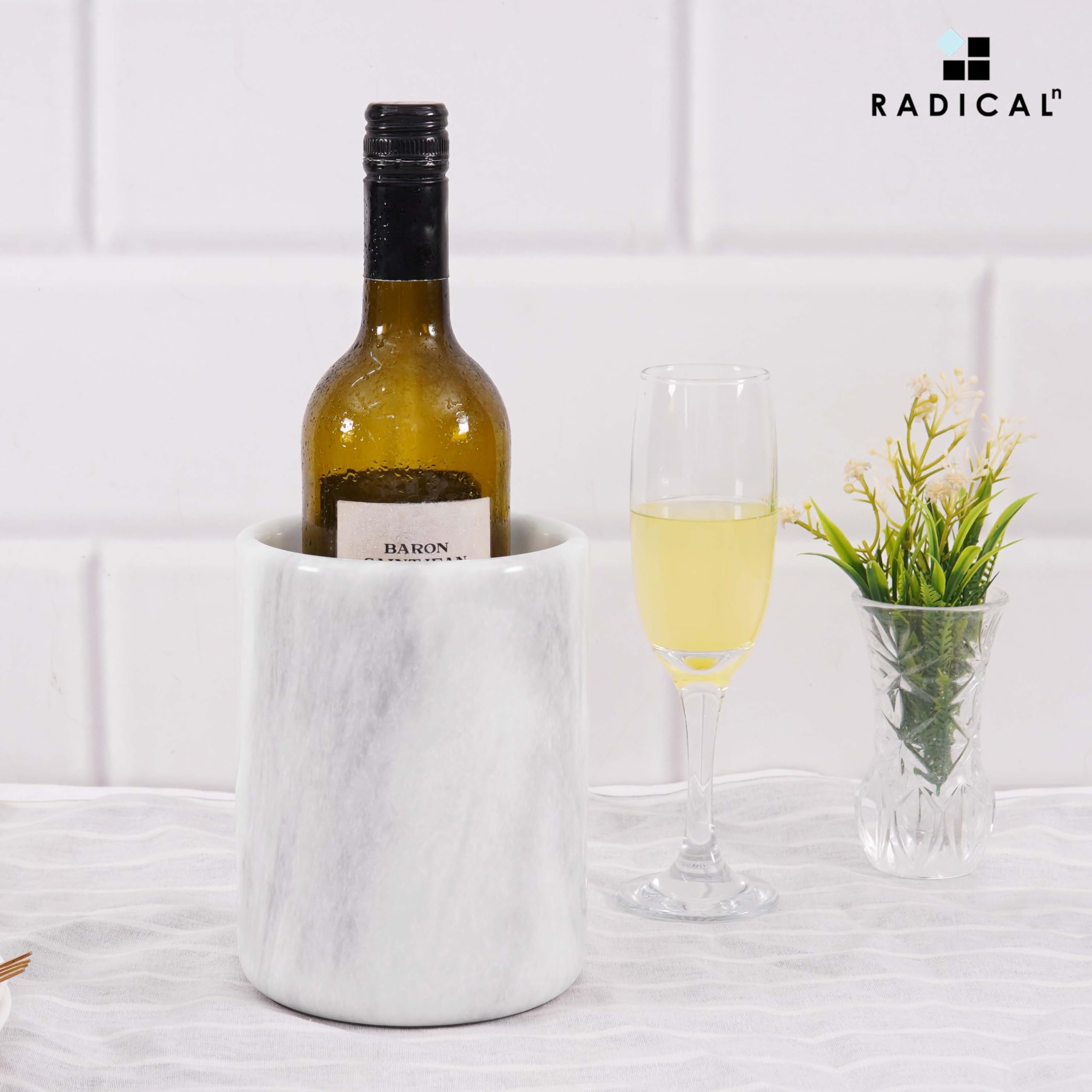 Radicaln marble wine chiller insulated design maintains champagne temperature.