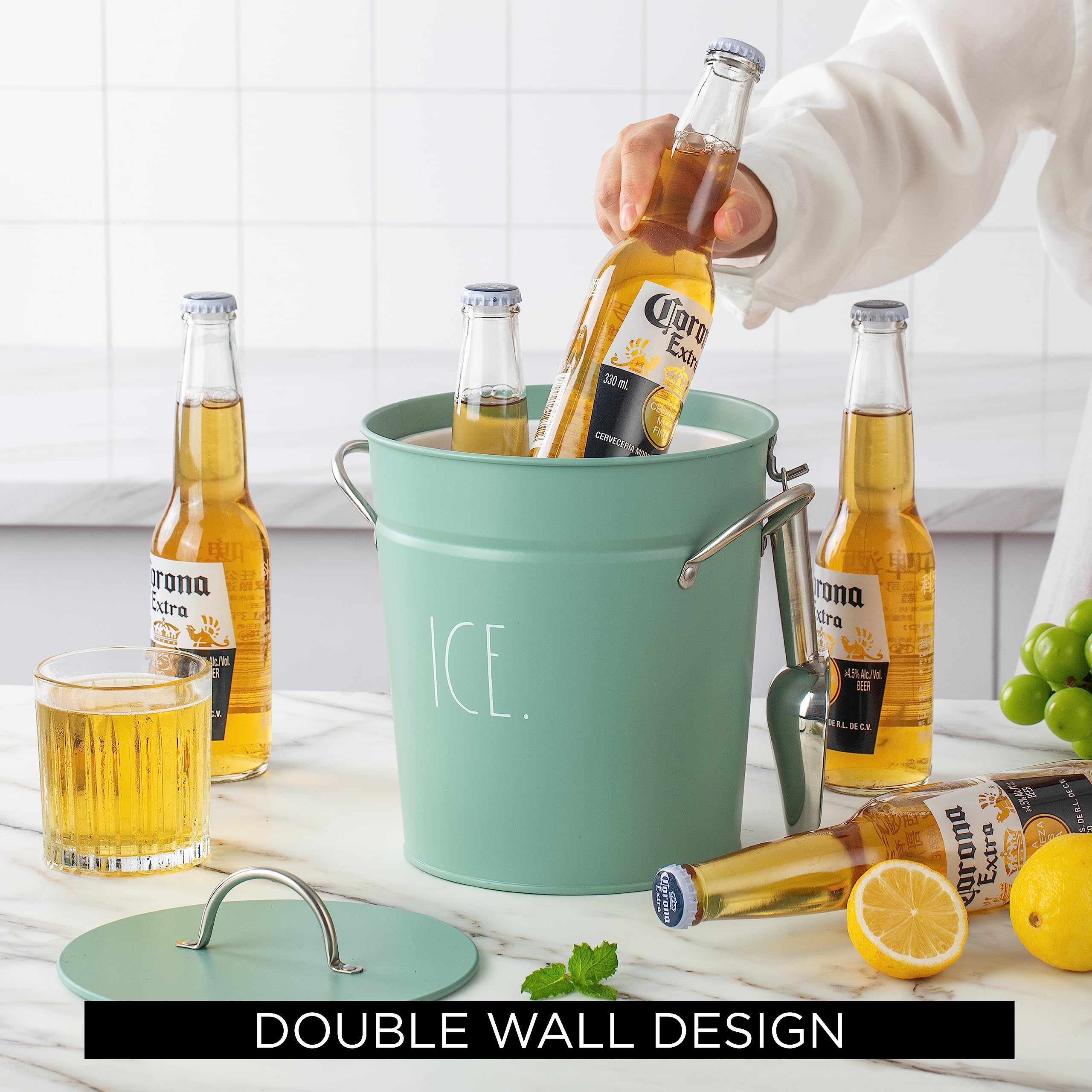 Rae Dunn ice bucket ideal for backyard BBQs and picnics with a sturdy scoop.