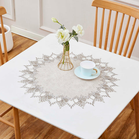 Raedan beige lace table topper in a 24-inch round shape for versatile decor